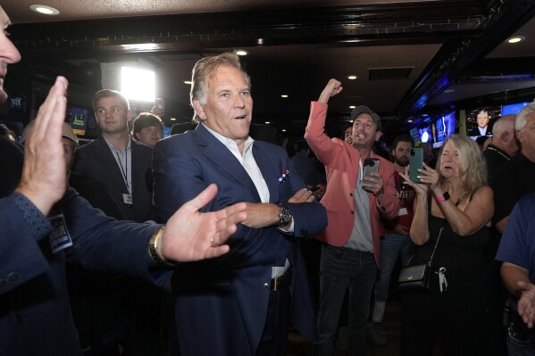 Former U.S. Rep. and Republican candidate for Michigan Senate Mike Rogers waits to address supporters at a post election gathering, Tuesday, Aug. 6, 2024, in Lake Orion, Mich. (AP Photo/Carlos Osorio)