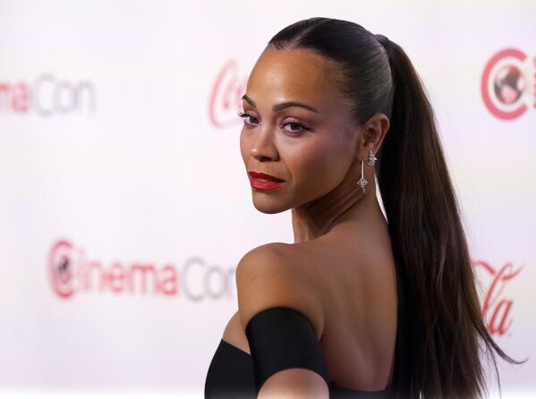 FILE - Zoe Saldana arrives at the Big Screen Achievement Awards during CinemaCon in Las Vegas on April 28, 2022. Saldana stars in the Netflix series "From Scratch."(AP Photo/Chris Pizzello, File)