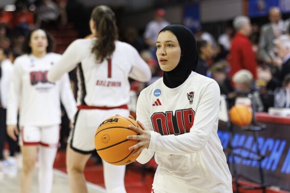 North Carolina State's Jannah Eissa warms up prior to a second-round college basketball game against Tennessee in the NCAA Tournament in Raleigh, N.C., Monday, March 25, 2024. (AP Photo/Ben McKeown)