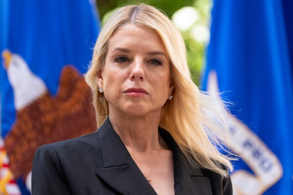 Attorney General Pam Bondi listens during a news conference at the Department of Justice, Wednesday, May 7, 2025, in Washington. (AP Photo/Alex Brandon)