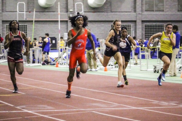 Bloomfield High School transgender athlete Terry Miller, second from left, wins the final of the 55-meter dash over transgender athlete Andraya Yearwood, far left, and other runners in the Connecticut girls Class S indoor track meet at Hillhouse High School in New Haven, Conn., Feb. 7, 2019. (AP Photo/Pat Eaton-Robb, File)
