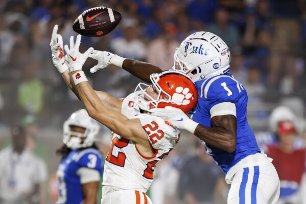 Duke's Myles Jones (1) breaks up a pass intended for Clemson's Cole Turner (22) during the first half of an NCAA college football game in Durham, N.C., Monday, Sept. 4, 2023. (AP Photo/Ben McKeown)