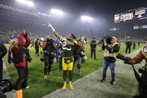 Green Bay Packers cornerback Jaire Alexander (23) celebrates following an NFL football game against the Chicago Bears Sunday, Jan. 7, 2024, in Green Bay, Wis. The Packers won 17-9. (AP Photo/Mike Roemer)