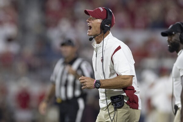 Oklahoma coach Brent Venables yells to the team during the second half of an NCAA college football game against SMU, Saturday, Sept. 9, 2023, in Norman, Okla. (AP Photo/Alonzo Adams)