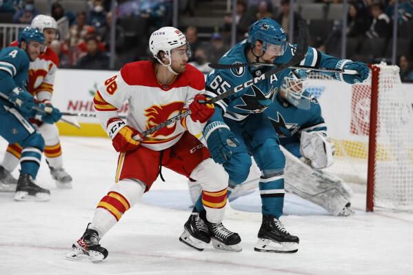 Toffoli scores twice as Flames defeat Sharks to continue playoff push