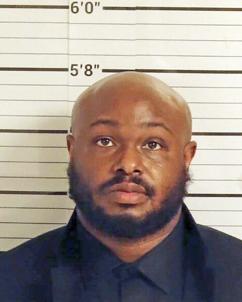 FILE - This Jan. 26, 2023, booking photo released by the Shelby County, Tenn., Sheriff's Office shows former Memphis Police Officer Desmond Mills Jr. in Memphis. Mills Jr. is changing his plea from not guilty on federal charges that he violated Tyre Nichols' civil rights by fatally beating him after a traffic stop in January 2023. A change of plea hearing has been scheduled for Thursday, Nov. 2, for Mills Jr., according to court documents and his lawyer. (Shelby County Sheriff's Office via AP, File)