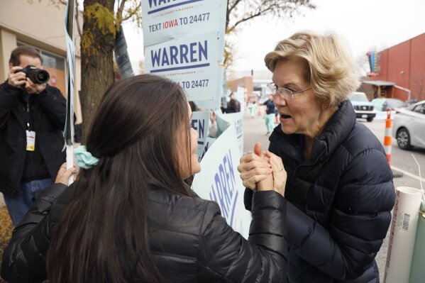 Democratic presidential candidate Sen. Elizabeth Warren greets supporters before the Iowa Democratic Party's Liberty and Justice Celebration, Friday, Nov. 1, 2019, in Des Moines, Iowa. (AP Photo/Charlie Neibergall)