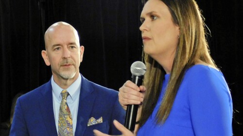 FILE - Arkansas Gov. Sarah Huckabee Sanders, right, and Arkansas Secretary of Education Jacob Oliva discuss several aspects of the LEARNS Act on Monday evening, April 24,2023, in the Simpson Theatre at Arkansas State University's Fowler Center in Jonesboro, Ark. An Arkansas judge ruled Friday, June 30, 2023, that a recently passed education law cannot take effect until Aug. 1, putting in doubt state education officials' vote to let a charter school organization take over a small school district. (Nena Zimmer/The Jonesboro Sun via AP, File)