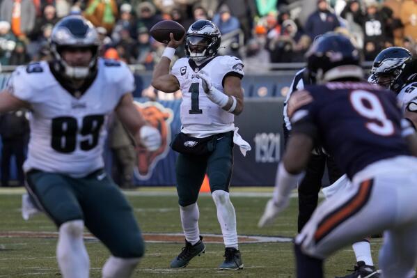 Philadelphia Eagles' Jalen Hurts passes during the second half of an NFL football game against the Chicago Bears, Sunday, Dec. 18, 2022, in Chicago. (AP Photo/Nam Y. Huh)