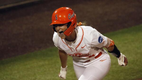 Naomi has a HR and 4 RBIs, Oklahoma St. clinches 4th straight WCWS berth