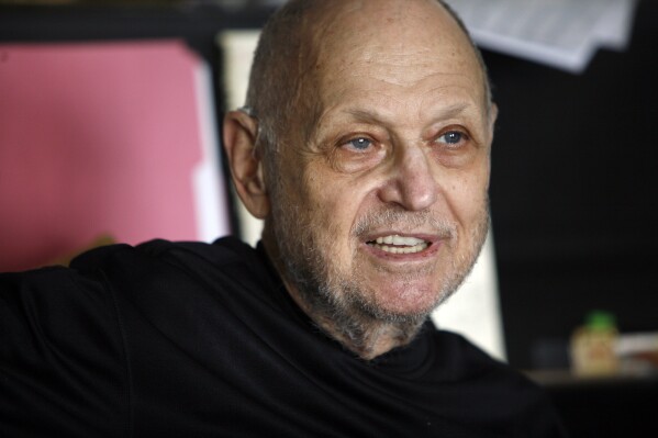 Composer Charles Strouse is interviewed in his apartment, June 3, 2008, in New York. (AP Photo/Richard Drew, File)