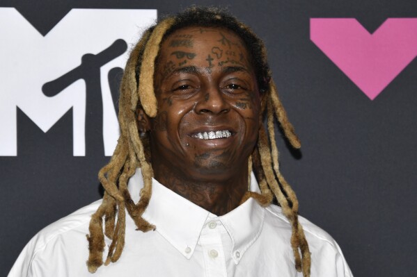 Lil Wayne poses in the press room at the MTV Video Music Awards on Tuesday, Sept. 12, 2023, at the Prudential Center in Newark, N.J. (Photo by Evan Agostini/Invision/AP)