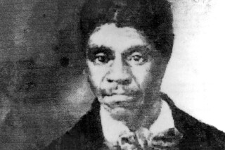 Shown is a copy of a photograph taken in the 1800s of slave Dred Scott that was found in the historic courthouse located in Thebes, Ill. Scott, the slave whose legal fight for freedom became a landmark U.S. court ruling, is said to have done time in the dungeons below the old courthouse. (AP Photo/The Southeast Missourian)