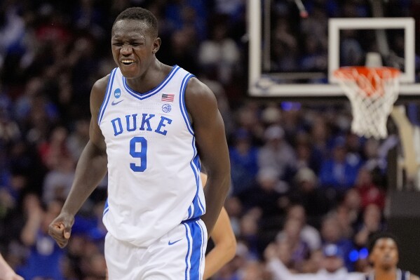 Duke center Khaman Maluach (9) reacts during the second half of a Sweet 16 round NCAA college basketball tournament game against Arizona, Thursday, March 27, 2025, in Newark, N.J. (AP Photo/Julia Demaree Nikhinson, File)