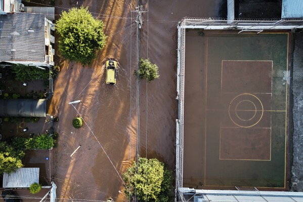 View of an area flooded by heavy rains in Porto Alegre, Rio Grande do Sul state, Brazil, Monday, May 6, 2024. (AP Photo/Carlos Macedo)