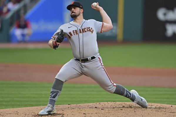 San Francisco Giants starting pitcher Carlos Rodon delivers in the first inning of a baseball game against the Cleveland Guardians, Friday, April 15, 2022, in Cleveland. (AP Photo/David Dermer)