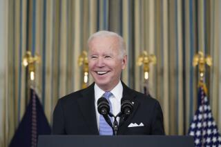President Joe Biden speaks about the bipartisan infrastructure bill in the State Dinning Room of the White House, Saturday, Nov. 6, 2021, in Washington. (AP Photo/Alex Brandon)