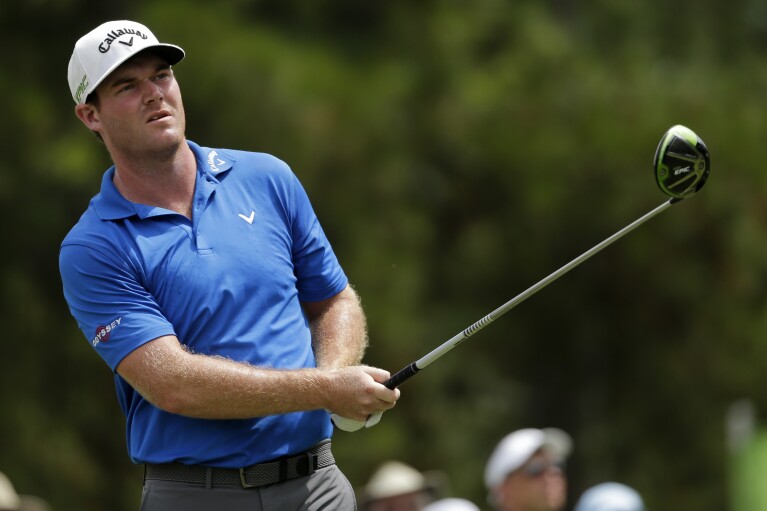 FILE -Grayson Murray watches his tee shot on the third hole during the final round of the PGA Championship golf tournament at the Quail Hollow Club Sunday, Aug. 13, 2017, in Charlotte, N.C. Two-time PGA Tour winner Grayson Murray died Saturday morning, May 25, 2024 at age 30, one day after he withdrew from the Charles Schwab Cup Challenge at Colonial.(AP Photo/Chuck Burton, File)