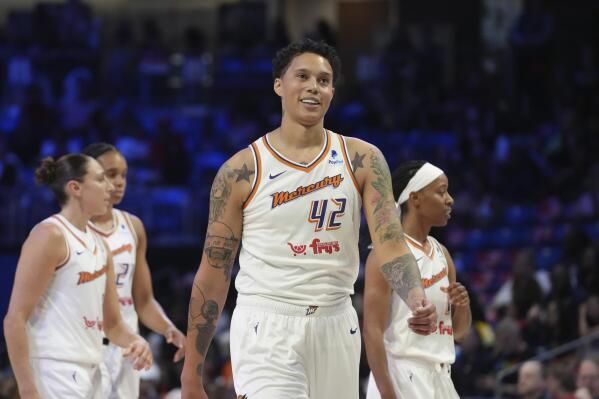 Phoenix Mercury center Brittney Griner (42) smiles as she walks the floor after a timeout during the first half of a WNBA basketball basketball game against the Dallas Wings in Arlington, Texas, Friday, June 9, 2023. (AP Photo/LM Otero)