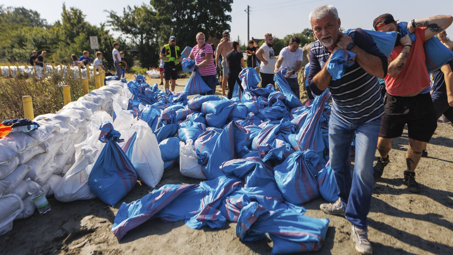 Budapest and Poland’s Wroclaw reinforce river banks in anticipation of more flooding