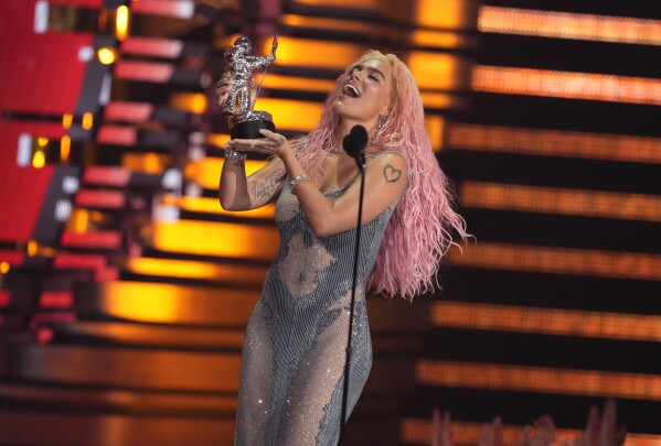 Karol G accepts the award for best collaboration for "TQG" during the MTV Video Music Awards on Tuesday, Sept. 12, 2023, at the Prudential Center in Newark, N.J. (Photo by Charles Sykes/Invision/AP)