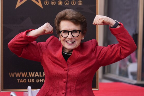 Billie Jean King poses with her new star at a ceremony on the Hollywood Walk of Fame on Monday, April 7, 2025, in Los Angeles. (AP Photo/Chris Pizzello)