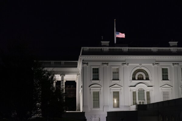 The flag at the White House flies at half-staff Friday, Sept. 18, 2020, in Washington, after the Supreme Court announced that Supreme Court Justice Ruth Bader Ginsburg has died of metastatic pancreatic cancer at age 87. (AP Photo/Alex Brandon)