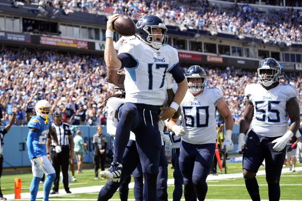 Tennessee Titans quarterback Ryan Tannehill (17) celebrates his rushing touchdown during the second half of an NFL football game against the Los Angeles Chargers Sunday, Sept. 17, 2023, in Nashville, Tenn. (AP Photo/George Walker IV)