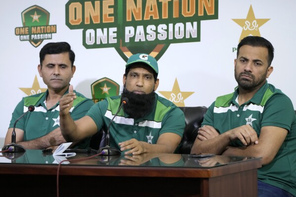 Members of Pakistan cricket team's selection committee, from left to right, Abdul Razak, Mohammad Yousaf and Wahab Riaz give a press conference to announce squad for upcoming T20 cricket matches against Ireland and England, in Lahore, Pakistan, Thursday, May 2, 2024. Pakistan recalled fast bowler Hasan Ali as backup for injured Haris Rauf for the Twenty20 series against Ireland and England as it searches for the right pace combination for next month's T20 World Cup. (AP Photo/K.M. Chaudary)