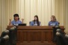 B Rosas, left, Lucia Everist, center, and Libby Kramer, of Climate Generation, speak to the Minnesota Youth Council, Tuesday, Feb. 27, 2024, in St. Paul, Minn. The advocates called on the council, a liaison between young people and state lawmakers, to support a bill requiring schools to teach more about climate change. (AP Photo/Abbie Parr)