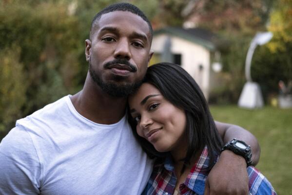 This image released by Amazon shows Michael B. Jordan, left, with Lauren London in “Tom Clancy’s Without Remorse," streaming Friday on Amazon. (Nadja Klier/Amazon via AP)