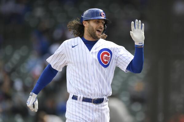 Chicago Cubs' Jake Marisnick celebrates at the dugout after hitting a solo home run during the fourth inning of a baseball game against the Milwaukee Brewers, Friday, April 23, 2021, in Chicago. (AP Photo/Paul Beaty)
