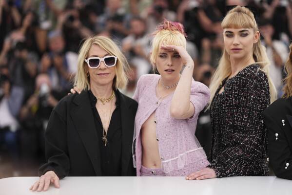 Thora Birch, from left, director Kristen Stewart, and Imogen Poots pose for photographers at the photo call for the film 'The Chronology of Water' at the 78th international film festival, Cannes, southern France, Friday, May 16, 2025. (Photo by Scott A Garfitt/Invision/AP)