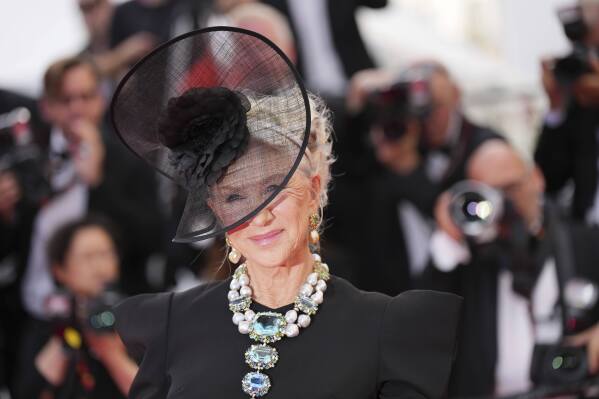Helen Mirren poses for photographers upon arrival at the premiere of the film 'Colours of Time' at the 78th international film festival, Cannes, southern France, Thursday, May 22, 2025. (Photo by Lewis Joly/Invision/AP)