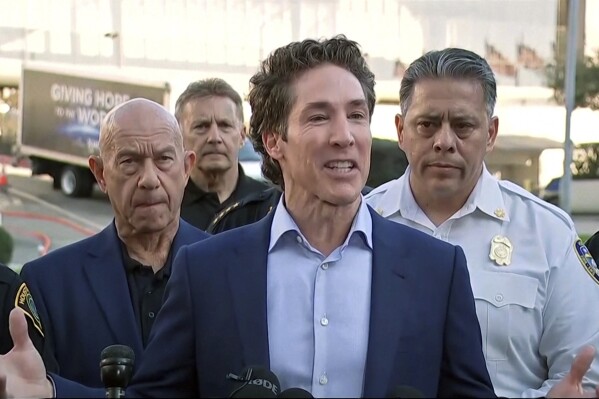 In this screen grab taken from video provided by KTRK-TV ABC13, pastor Joel Osteen speaks to the media after a shooting at Lakewood Church, in Houston, Sunday, Feb. 11, 2024. (KTRK-TV ABC13 via AP)
