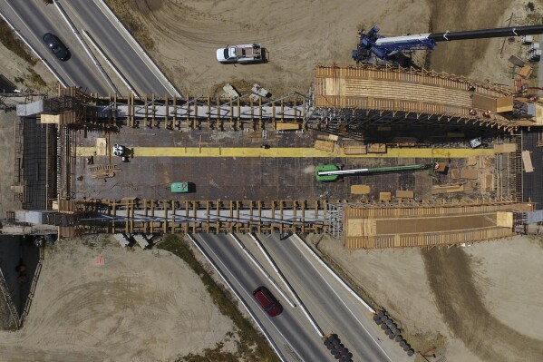 The tied Archbridge construction site offers aerial views of the high-speed train on State Route 43, Fresno County, California, on Tuesday, April 15th, 2025 (AP Photo/Godofredo A.Vásquez)
