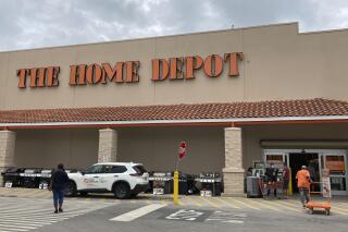 FILE - The Home Depot store is shown, Friday, May 14, 2021, in North Miami, Fla.  Home Depot reports quarterly financial results reports quarterly financial results Tuesday, Nov. 15, 2022  (AP Photo/Wilfredo Lee, File)