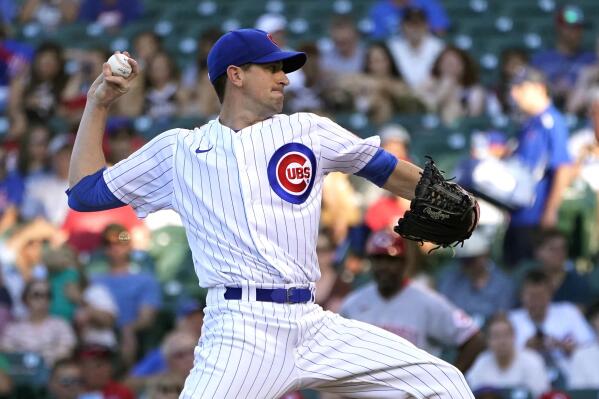 FILE - Chicago Cubs starting pitcher Kyle Hendricks delivers during the first inning of the team's baseball game against the Cincinnati Reds on Thursday, June 30, 2022, in Chicago. Hendricks will not return this season after he was hampered by shoulder trouble for much of the year. He finishes with a 4-6 record and a career-high 4.80 ERA in 16 starts. (AP Photo/Charles Rex Arbogast, File)