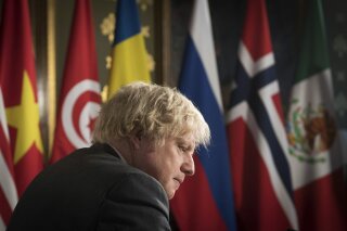 Britain's Prime Minister Boris Johnson chairs a session of the UN Security Council on climate and security at the Foreign, Commonwealth and Development Office in London, Tuesday, Feb. 23, 2021. (Stefan Rousseau/Pool Photo via AP)
