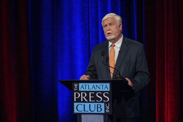 FILE - Georgia Republican Wayne Johnson speaks during a debate sponsored by the Atlanta Press Club with Republican Chuck Hand on Sunday, June 9, 2024, in Atlanta. Both candidates are competing in a Tuesday, June 18, 2024, runoff for the GOP nomination in southwest Georgia's 2nd Congressional District. (J. Glenn/Pool via AP, File)