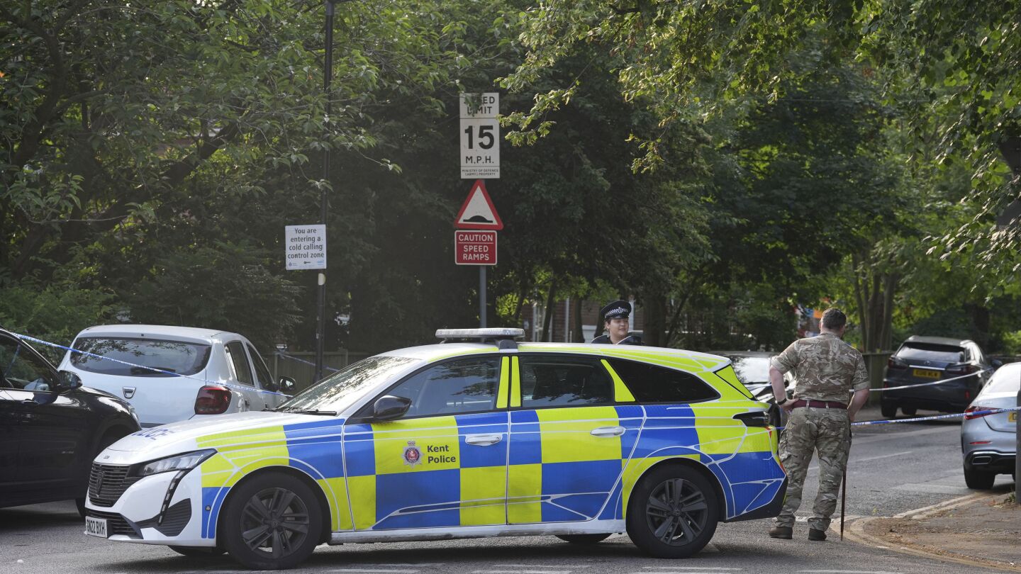 Man arrested after British soldier was stabbed and seriously hurt in attack near barracks