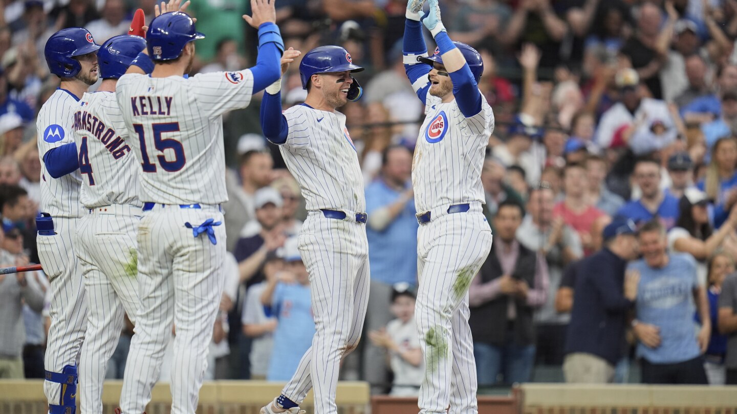 Kelly homers twice, Tucker hits go ahead shot as Cubs outslug Diamondbacks 13-11