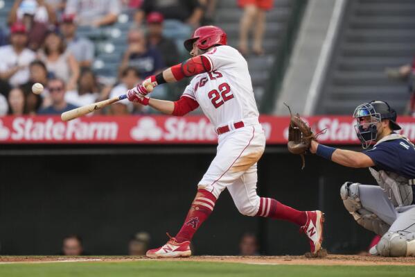 Los Angeles Angels' David Fletcher (22) doubles during the second inning of a baseball game against the Seattle Mariners Saturday, July 17, 2021, in Anaheim, Calif. Taylor Ward, Juan Lagares, and Jack Mayfield scored. (AP Photo/Ashley Landis)