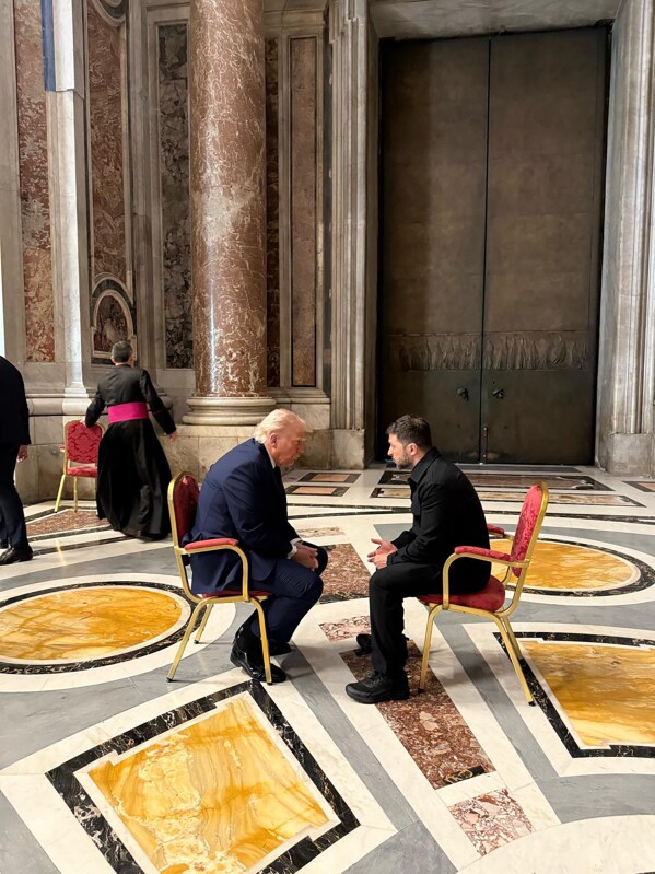 In this photo provided by the Ukrainian Presidential Press Office, Ukraine's President Volodymyr Zelenskyy, right, and President Donald Trump, talk as they attend the funeral of Pope Francis in Vatican, Saturday, April 26, 2025.(Ukrainian Presidential Press Office via AP)