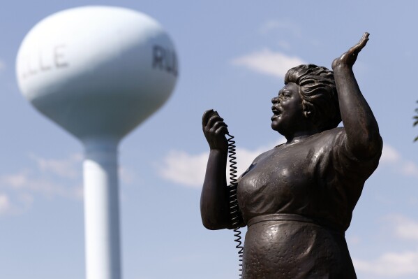 FILE - A statue of the late civil rights activist Fannie Lou Hamer is displayed in a memorial garden in her hometown of Ruleville, Miss., on Oct. 5, 2017. (AP Photo/Rogelio V. Solis, File)