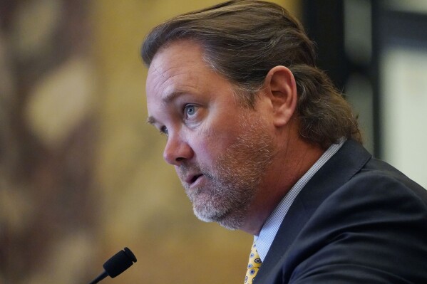 FILE - Mississippi Sen. Scott DeLano, R-Biloxi, presents an appropriations bill for a vote in the Senate chamber at the state Capitol, March 15, 2022, in Jackson, Miss. Under a bill passed by the state Senate on Wednesday, March 6, 2024, local prosecutors could charge people who possess and manufacture modified machine guns. These weapons, which are made with 3-D printers and can be bought on the internet, can fire multiple rounds at a rapid clip. The proliferation of these devices has led to deadly crimes, DeLano said. (AP Photo/Rogelio V. Solis, File)