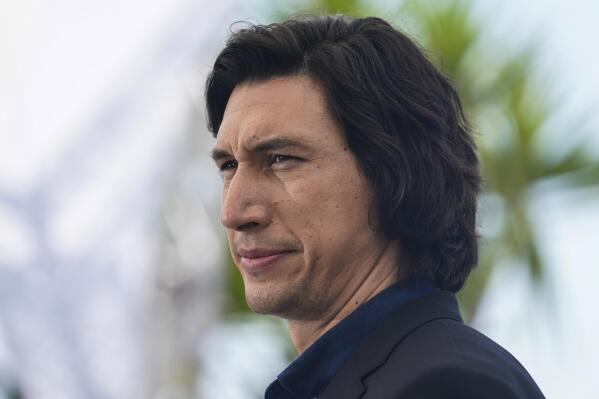 FILE - Adam Driver poses for photographers at the photo call for the film "Annette" at the 74th international film festival, Cannes, southern France, on July 6, 2021. The film opens in theaters nationwide on Friday and debuts Aug. 20 on Amazon Prime. (AP Photo/Brynn Anderson, File)