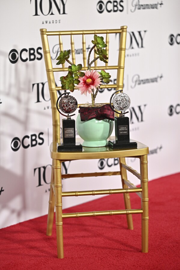Hwaboon the plant from "Maybe Happy Ending" appears in the press room with the awards for best original score and best book of a musical during the 78th Tony Awards on Sunday, June 8, 2025, at Radio City Music Hall in New York. (Photo by Evan Agostini/Invision/AP)