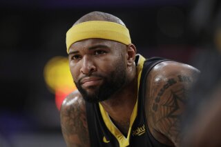 FILE - In this Thursday, April 4, 2019, file photo, then-Golden State Warriors' DeMarcus Cousins is seen during the first half of an NBA basketball game against the Los Angeles Lakers in Los Angeles. Longtime Sacramento Kings broadcaster Grant Napear has resigned after he tweeted “ALL LIVES MATTER” when asked by DeMarcus Cousins for his opinion on the Black Lives Matter movement. The 60-year-old Napear also was fired by KTHK Sports 1140 in Sacramento. (AP Photo/Marcio Jose Sanchez, File)