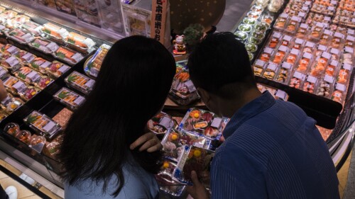 Customers browse Japanese imported sea products in Hong Kong, Wednesday, July 12, 2023. Hong Kong would immediately ban the import of aquatic products from Fukushima and other Japanese prefectures if Tokyo discharges treated radioactive wastewater into the sea, a top official in the city said Wednesday. (AP Photo/Louise Delmotte)